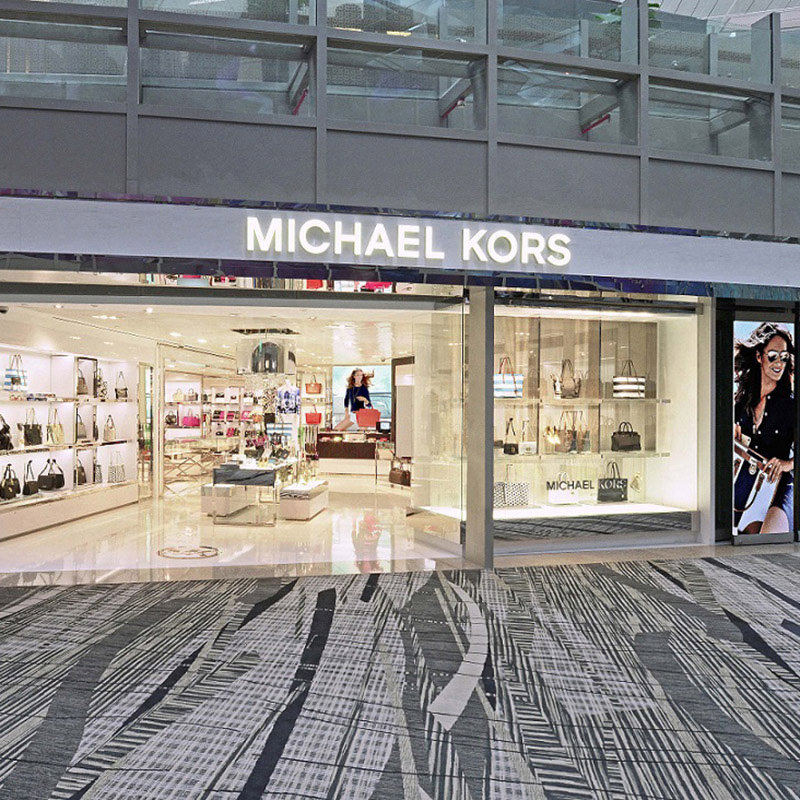 Michael Kors | Michael Kors opens largest airport store at Singapore’s ...