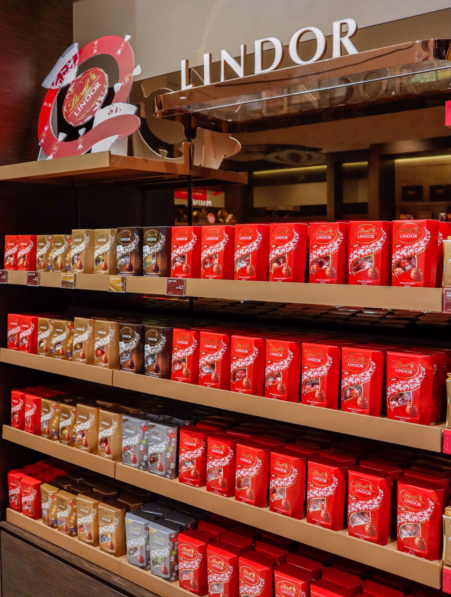 Wall of LINDOR chocolate truffles at Lindt TRX